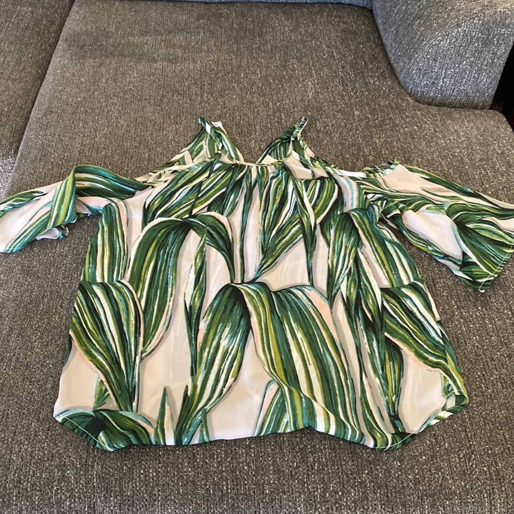 Cold shoulder blouse.